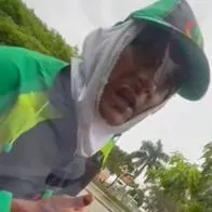 (Vídeo) Por no comprarle, vendedor ambulante escupe a conductora