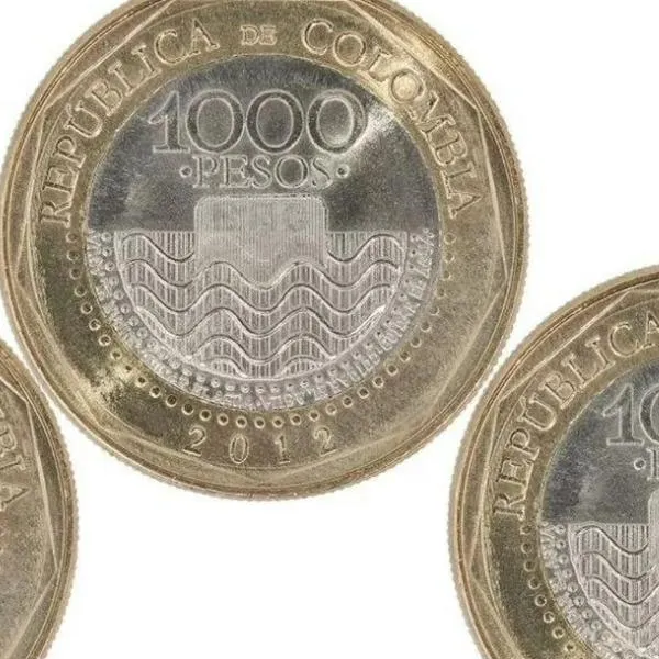 Foto de monedas de 1.000 pesos, por cómo ahorrar 10 millones de pesos en dos años