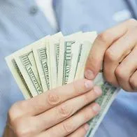 Foto de dólares, en nota de que Fed en Estados Unidos mantuvo tasas de interés: cómo impacta en precio de dólar en Colombia