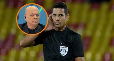El periodista Carlos Antonio Vélez y el árbitro de Millonarios-América, Jorge Duarte.