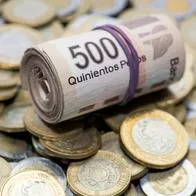 Billetes mexicanos en nota sobre cuántos son 3.500 pesos mexicanos en pesos colombianos