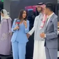 Foto de periodista y androide, en nota de que robot androide tocó a presentadora en vivo y ella reaccionó: qué causó el hecho (video)