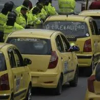Taxistas bloquean el paso al aeropuerto El Dorado, en Bogotá