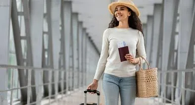 Foto de viajera, en nota de qué pasa si nombre está mal escrito en pase de abordar en Colombia 