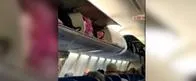 EN VIDEO: ¡A mimir! Una mujer se subió al compartimiento de maletas de un avión para tomar una siesta