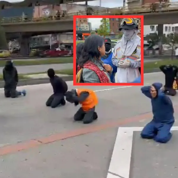 Protesta U. Nacional: mujer frenó a encapuchados que iban a cerrar la carrera 30