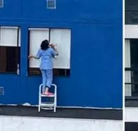 Bogotá hoy: video viral de mujer limpiando vidrios desde un piso 23