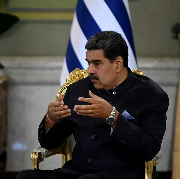 Venezuelan President Nicolas Maduro speaks with the new Uruguayan ambassador to Venezuela, Eber Da Rosa (out of frame), during the presentation of credentials at Miraflores Presidential Palace in Caracas on June 15, 2023. (Photo by YURI CORTEZ / AFP)