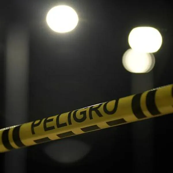 Agentes del CTI, realizan el levantamiento del cuerpo del director de la crcel La Modelo, quin se movilizaba en un carro particular