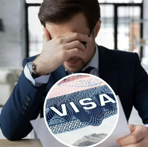 Foto de hombre preocupado y visado, en nota de cuál es error más común en renovación de visa americana en Colombia, muy simple