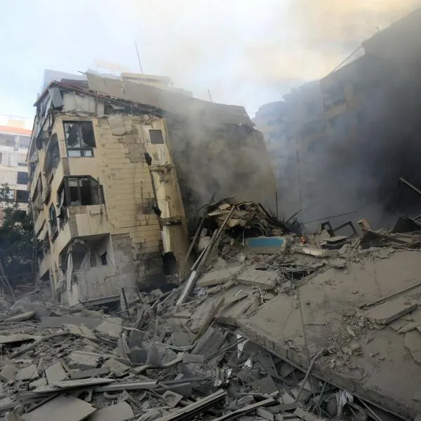 Smoke rises from buildings hit in an overnight Israeli airstrike that targeted the neighbourhood of Al-Jamous in Beirut's southern suburbs on October 3, 2024. - Israel kept up its bombardment of Beirut after Iran launched its second, and largest, attack on Israel in months, which prompted Prime Minister Benjamin Netanyahu to warn Tehran would pay. (Photo by AFP)