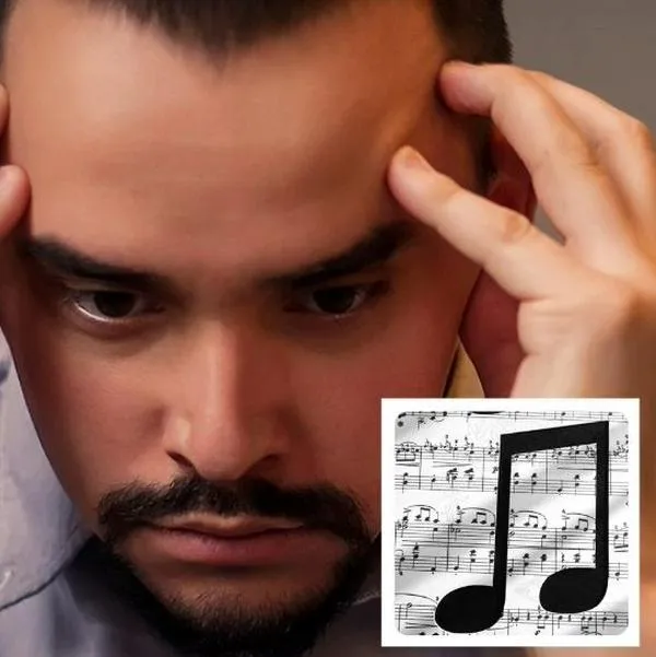 Foto hombre molesto y música, en nota de qué significa que se quede pegada una canción que no gusta, según la psicología