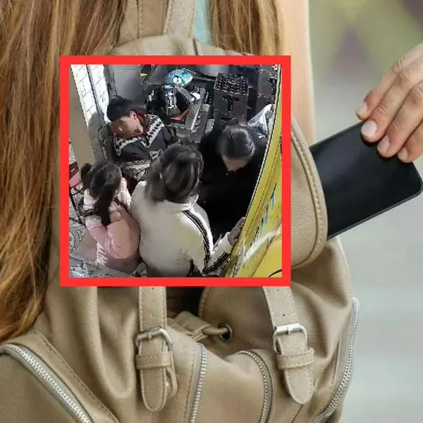Mujer induce a niña a robar celulares en comercios de Cundinamarca; video clave