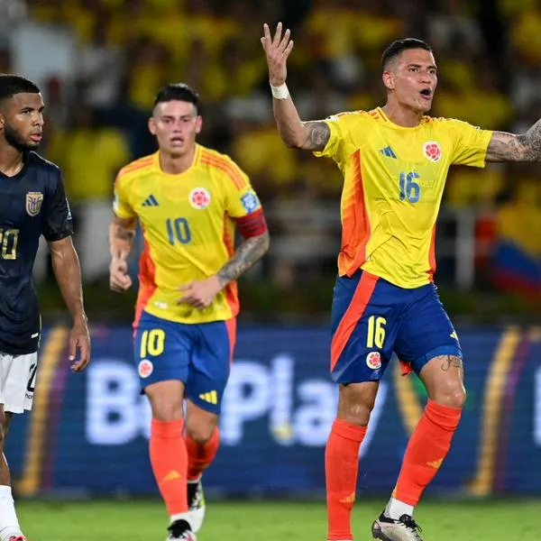 Juan Portilla y James Rodríguez en el Metropolitano. 