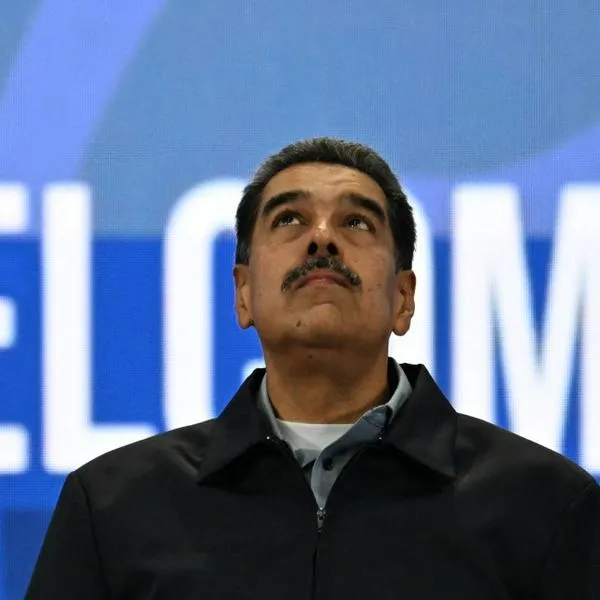 Venezuelan president Nicolas Maduro gestures during the closing session of the Antifascist Global Parliamentary Forum in Caracas on November 5, 2024. (Photo by Juan BARRETO / AFP)