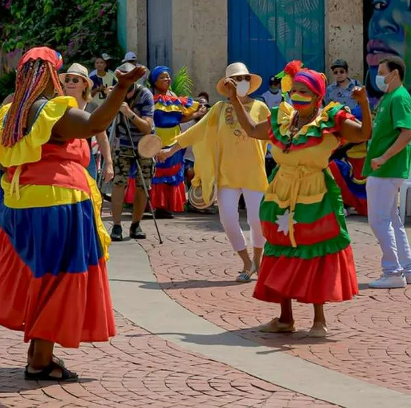 Foto de palenqueras, en nota de cuáles son los pueblos más rumberos de Colombia para ir en diciembre, según IA
