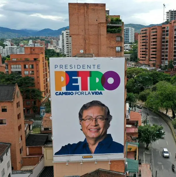 Aerial view of a billboard with electoral propaganda of the Colombian presidential candidate for the Historic Pact coalition, Gustavo Petro, in Cali, Colombia, on May 23, 2022. Colombia will hold presidential elections on May 29. (Photo by Raul ARBOLEDA / AFP)