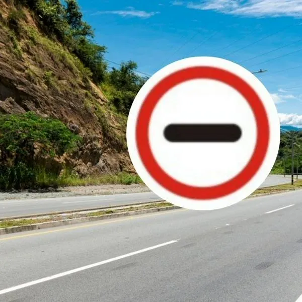 Qué significa la señala con una línea en el centro: señal de tránsito SR-36 y qué significa en vías de Colombia y multas de tránsito.