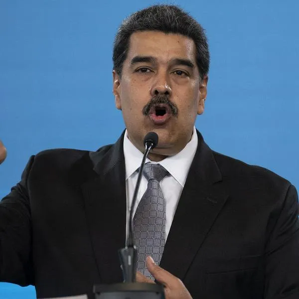 Venezuelan President Nicolas Maduro gestures while speaking during a press conference at Miraflores Presidential Palace in Caracas on February 17, 2021. - Venezuela will start its vaccination campaign against COVID-19 on February 18, after the arrival of the first 100,000 doses of Russian Sputnik V vaccines, including in this first phase health personnel and government officials, President Nicolas Maduro said. (Photo by Yuri CORTEZ / AFP)