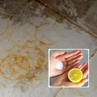 Foto piso manchado y limón y sal, en nota de cómo quitar las manchas de óxido de las baldosas con limón y sal, entre métodos