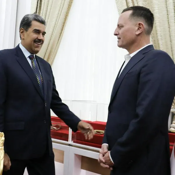 Handout picture released by Venezuela's Presidency shows Venezuela's president Nicolas Maduro (L) speaking with US President Donald Trump's special envoy Richard Grenell at Miraflores presidential palace in Caracas on January 31, 2025. (Photo by ZURIMAC CAMPOS and PRESIDENCIA VENEZUELA / Presidencia de Venezuela / AFP) / RESTRICTED TO EDITORIAL USE - MANDATORY CREDIT "AFP PHOTO / VENEZUELA'S PRESIDENCY / HANDOUT /  " - NO MARKETING NO ADVERTISING CAMPAIGNS - DISTRIBUTED AS A SERVICE TO CLIENTS