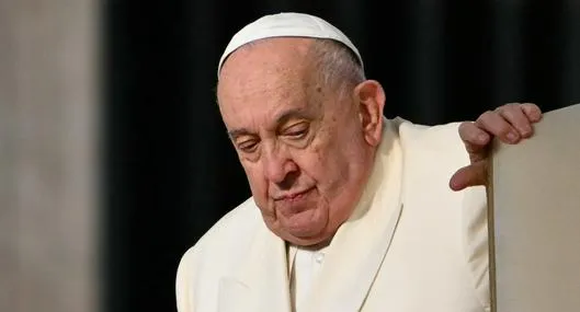 (FILES) Pope Francis arrives for the weekly general audience at St Peter's Square in The Vatican on November 13, 2024. Pope Francis, who has been diagnosed with pneumonia in both lungs, passed a "peaceful night" at the Gemelli hospital, the Vatican said on February 19, 2025, amid growing concerns over the 88-year-old's condition. (Photo by Alberto PIZZOLI / AFP)