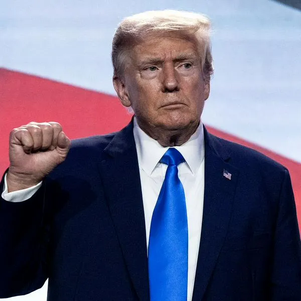(FILES) Former US President and Republican presidential hopeful Donald Trump gestures after speaking during the Pray Vote Stand summit at the Omni Shoreham hotel in Washington, DC on September 15, 2023. Former US president Donald Trump said he plans to appear in a New York court on October 2 for the opening of a trial in which he is accused of a years-long scheme to inflate the value of real estate and financial assets. (Photo by ANDREW CABALLERO-REYNOLDS / AFP)
