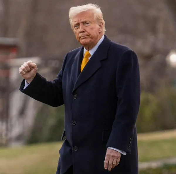 US President Donald Trump gestures as he departs the White House in Washington, DC, on March 7, 2025. Trump is traveling to his Mar-a-Lago resort in Florida. (Photo by Jim WATSON / AFP)