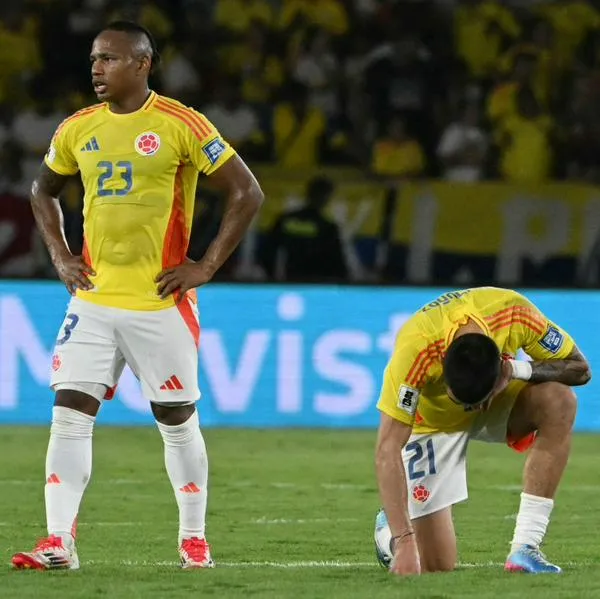 Jaminton Campaz y Daniel Muñoz, luego del empate ante Paraguay.