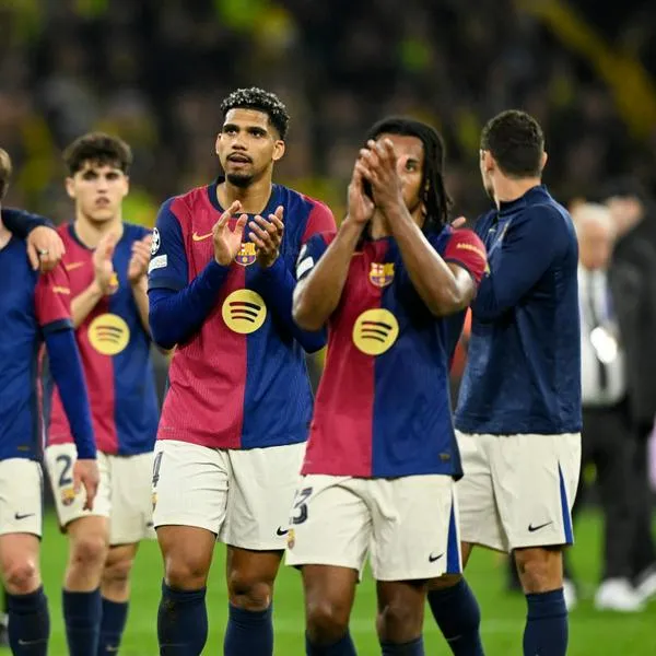 Jugadores del Barcelona celebran la clasificación en Champions League contra Borussia Dortmund / AFP