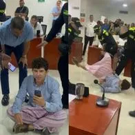 El concejal Miguel Martínez duró más de 40 minutos primeramente sentado en la mitad del recinto de Santa Marta antes de ser retenido por la Policía