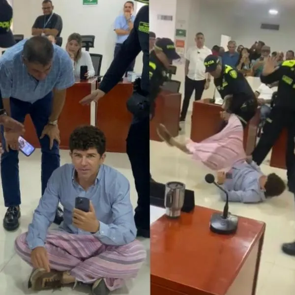 El concejal Miguel Martínez duró más de 40 minutos primeramente sentado en la mitad del recinto de Santa Marta antes de ser retenido por la Policía