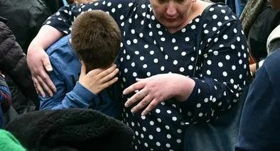 A student leaves the high school Notre-Dame de Toutes-Aides after a knife attack, one student was killed and three other were wounded in Nantes, western France, on April 24, 2025. A student armed with a knife attacked four of his classmates before being subdued by teaching staff, according to information obtained by AFP from a source close to the case. (Photo by Loic VENANCE / AFP)