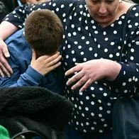 A student leaves the high school Notre-Dame de Toutes-Aides after a knife attack, one student was killed and three other were wounded in Nantes, western France, on April 24, 2025. A student armed with a knife attacked four of his classmates before being subdued by teaching staff, according to information obtained by AFP from a source close to the case. (Photo by Loic VENANCE / AFP)
