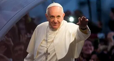 RIO DE JANEIRO, BRAZIL - JULY 26:  Pope Francis waves from the Popemobile on his way to attend the Via Crucis on Copacabana Beach during World Youth Day celebrations on July 26, 2013 in Rio de Janeiro, Brazil. More than 1.5 million pilgrims are expected to join the pontiff for his visit to the Catholic Church's World Youth Day celebrations which is running July 23-28. (Photo by Buda Mendes/Getty Images)