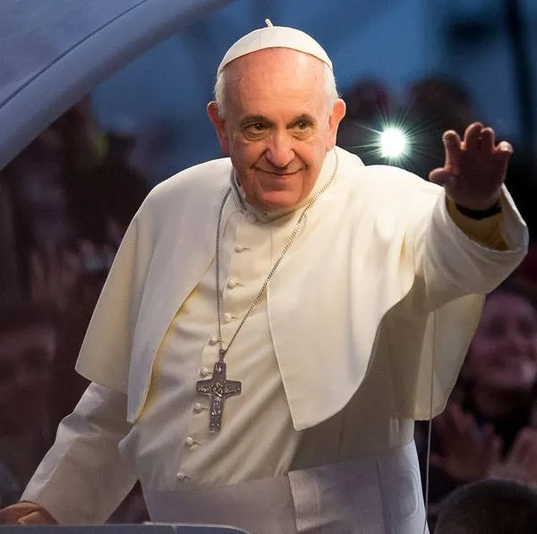 RIO DE JANEIRO, BRAZIL - JULY 26:  Pope Francis waves from the Popemobile on his way to attend the Via Crucis on Copacabana Beach during World Youth Day celebrations on July 26, 2013 in Rio de Janeiro, Brazil. More than 1.5 million pilgrims are expected to join the pontiff for his visit to the Catholic Church's World Youth Day celebrations which is running July 23-28. (Photo by Buda Mendes/Getty Images)