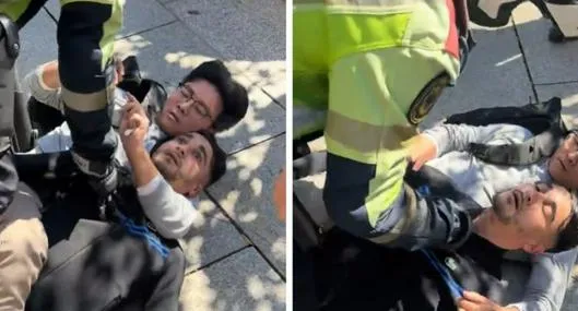 Momento en el que un fotógrafo somete a un ladrón con una llave de artes marciales