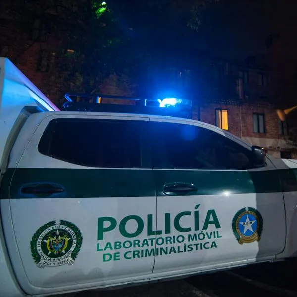Forensic technicians arrive at the Four Seasons Hotel (Casa Medina) where Taylor Hawkins, drummer of the rock band Foo Fighters, was staying and was reported dead hours before his presentation at the Estereo Picnic music festival, in Bogota, Colombia, March 25, 2022. (Photo by: Sebastian Barros/Long Visual Press/Universal Images Group via Getty Images)