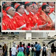 VATICAN CITY, VATICAN - MAY 07: Cardinals are shows on screen as people gather in St. Peter's Square and watch the Mass for the Election of the New Pope on screens before the start of the conclave on May 07, 2025 in Vatican City, Vatican. Cardinals of the Catholic Church have descended on Vatican City to commence the papal conclave, the secretive voting process held in the Sistine Chapel that requires a two-thirds majority to elect the new leader of the Catholic Church. The election follows the death of Pope Francis on April 21 at the age of 88. (Photo by Mario Tama/Getty Images)