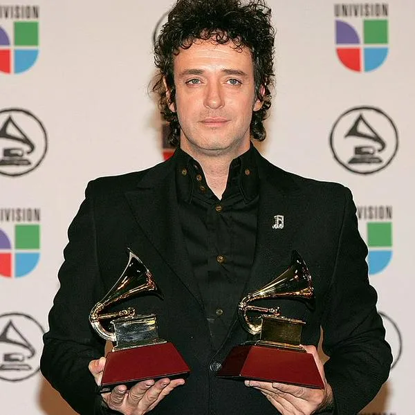 NEW YORK - NOVEMBER 02:  Gustavo Cerati poses with his awards for "Best Rock Solo Vocal Album" and "Best Rock Song" in the press room at the 7th Annual Latin Grammy Awards at Madison Square Garden November 2, 2006 in New York City.  (Photo by Bryan Bedder/Getty Images)