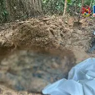 Fosa común en la que hallaron a los 8 líderes sociales y religiosos en Guaviare
