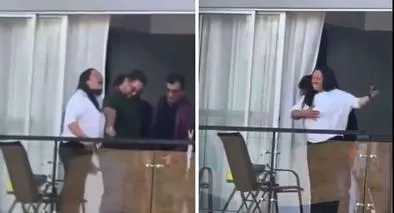 Momento en el que una mujer (ya identificada) dispara al aire en un conjunto de Bogotá