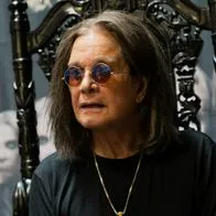 LONG BEACH, CALIFORNIA - SEPTEMBER 10: Musician Ozzy Osbourne signs copies of his album 