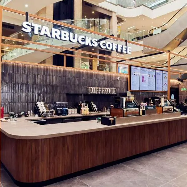 Starbucks redujo casi 50 % sus utilidades en segundo semestre, pero abrió 308 nuevas tiendas