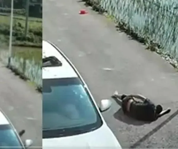 Hombre cae de gran altura y aterriza milagrosamente sobre un vehículo