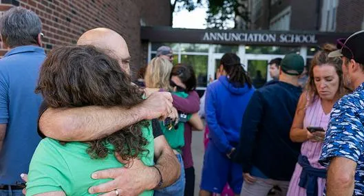 Parents await news during an active shooter situation at the Annunciation Church in Minneapolis, Minn., on Wednesday, Aug. 27, 2025.] (Photo by RICHARD TSONG-TAATARII/The Star Tribune via Getty Images)