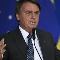 BRASILIA, BRAZIL - DECEMBER 07:  President of Brazil Jair Bolsonaro speaks during a ceremony  to sign terms and conditions for the use of 5g frequencies on December 7, 2021 in Brasilia, Brazil. (Photo by Mateus Bonomi/Getty Images)