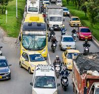 Bogota, Colombia, Avenida El Dorado, Calle 26, bottleneck merging traffic at rush hour. (Photo by: Jeffrey Greenberg/Universal Images Group via Getty Images)