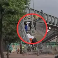 "Se partió todo": habló esposo de mujer que murió al caer de puente peatonal en calle 80 (Bogotá). Sufrió un problema cardiaco. 