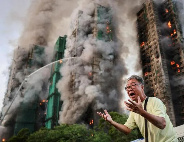 La Policía de Hong Kong arresta ocho personas tras el incendio que deja al menos 128 muertos